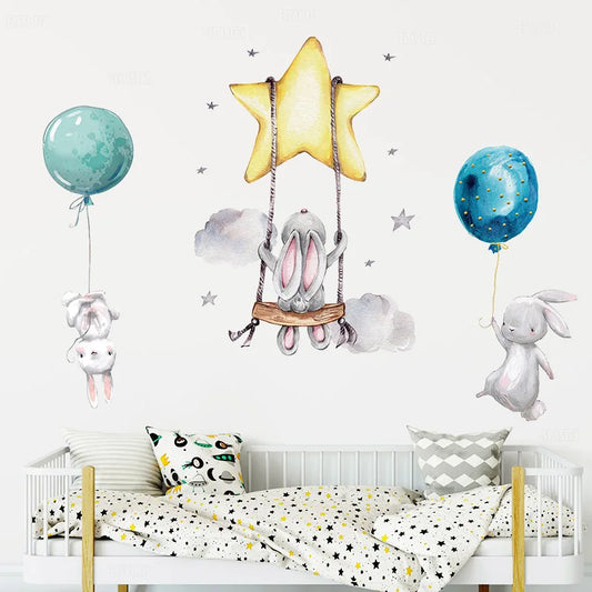 Cartoon Baby Rabbit Swinging on Stars Wall Decal | Kids Room Decor removable peel and stick wall decal by HomeDecorDecals.