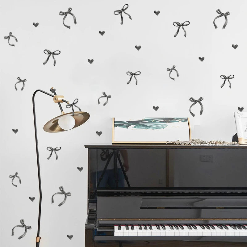 Close-up view of Black Love Bow Wall Decal | Home Decor by HomeDecorDecals.