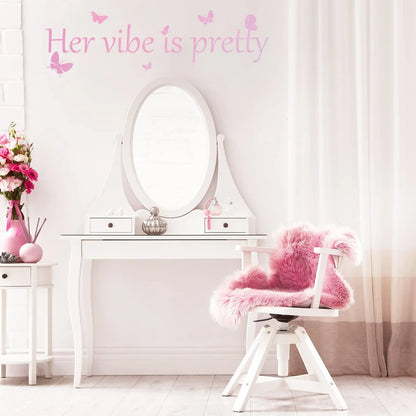 Close-up view of Pink "Her Vibe Is Pretty" Text Wall Decal | Room Decor by HomeDecorDecals.
